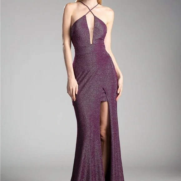 Fitted metallic gown with criss cross neckline and leg slit.
100% Polyester - Picture 3 of 3